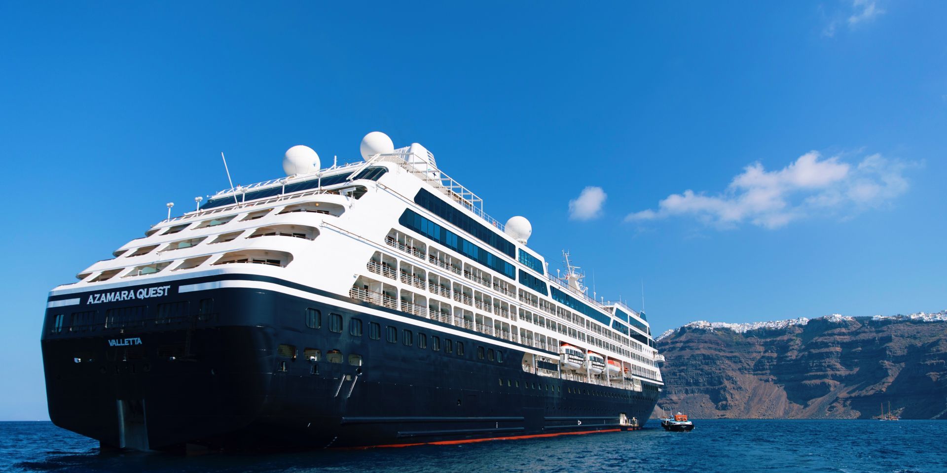 Azamara Journey docked at sunset